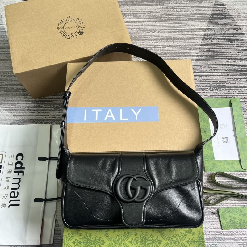 G*u*i top handle bags